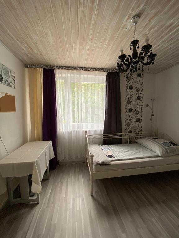 Postel nebo postele na pokoji v ubytování Gasthaus Zum Stadtwald