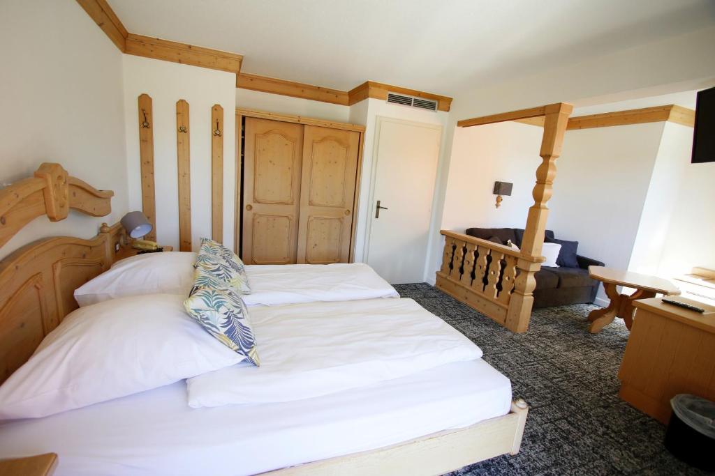 Postel nebo postele na pokoji v ubytování Les Portes de la Vallee