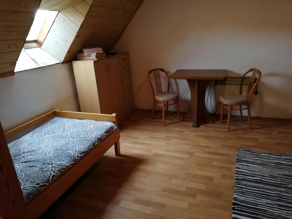 Postel nebo postele na pokoji v ubytování Pension Špejchar u Vojty