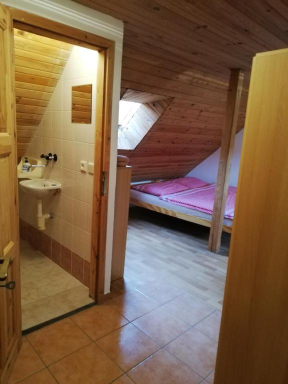 Postel nebo postele na pokoji v ubytování Pension Špejchar u Vojty