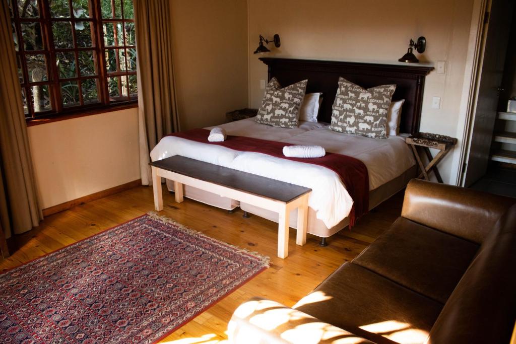 Una cama o camas en una habitación de Avoca River Cabins