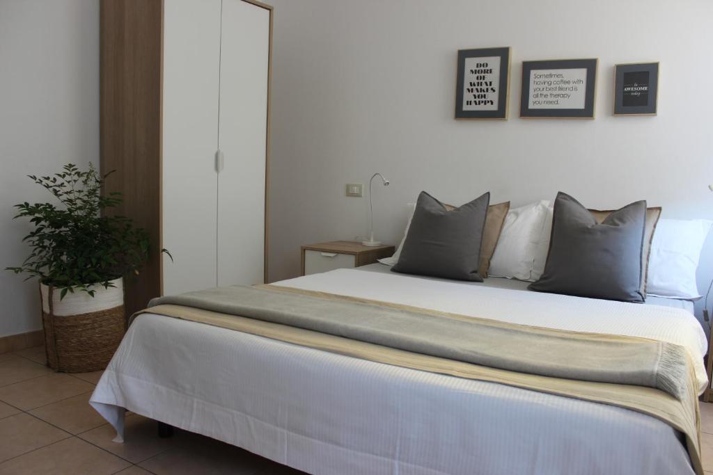 Posteľ alebo postele v izbe v ubytovaní Casa Vacanze Giorgetta 2-3 piano
