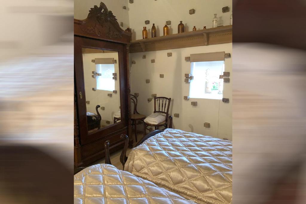 A bed or beds in a room at Yeniçeri Ahmet Ağa Konağı