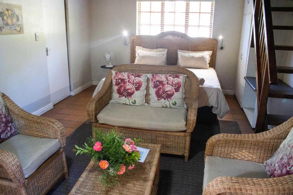Un lugar para sentarse en Avoca River Cabins