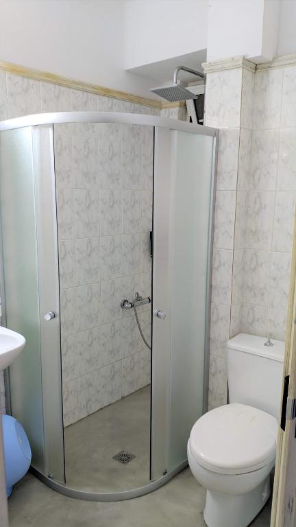 Kúpeľňa v ubytovaní Adonis Villa