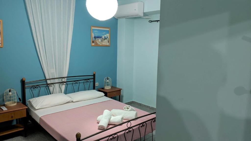 Posteľ alebo postele v izbe v ubytovaní Adonis Villa