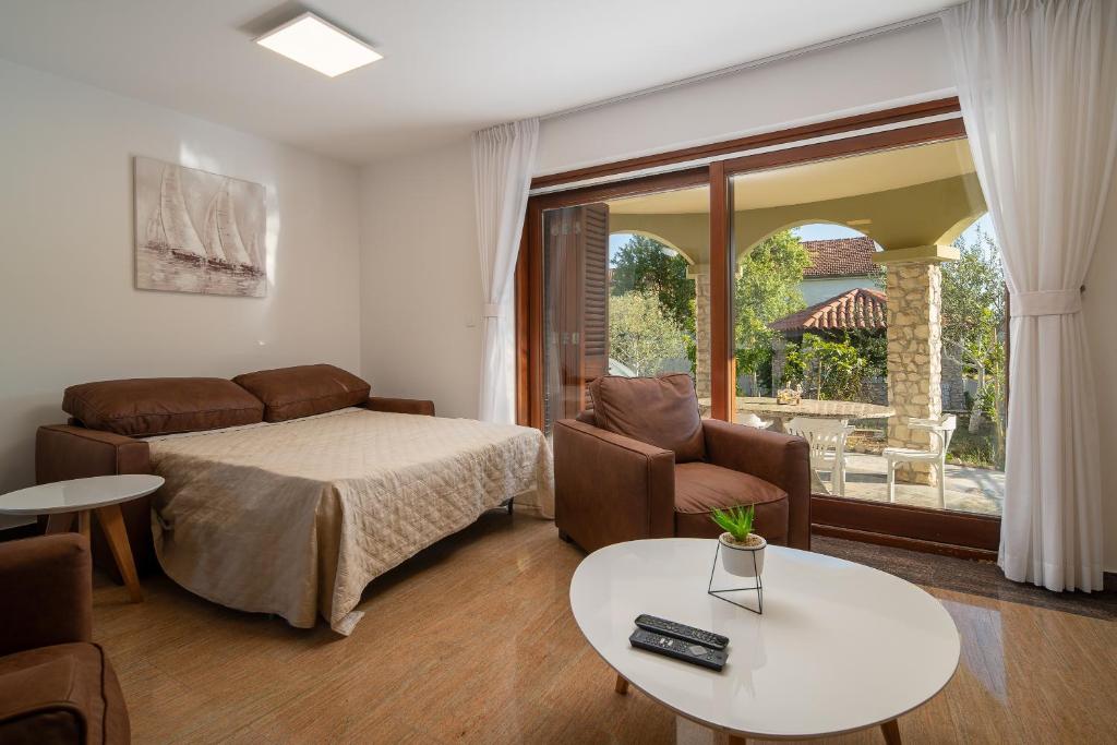 Postel nebo postele na pokoji v ubytování Lusi house