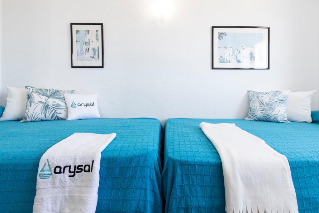 Postel nebo postele na pokoji v ubytování Apartamento Rodas Arysal