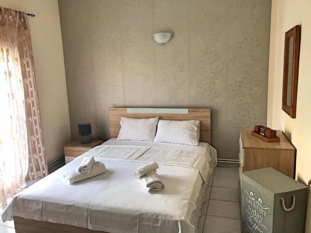Postel nebo postele na pokoji v ubytování Anastasia’s Home