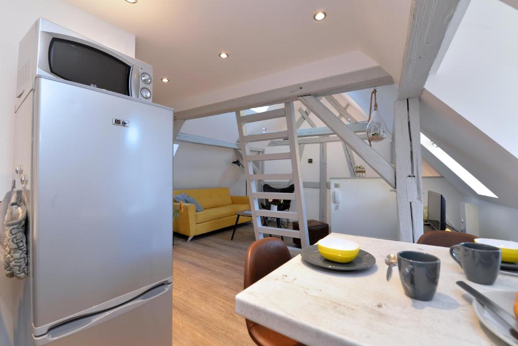 Appartement La petite terrasse sur les toits – photo 15