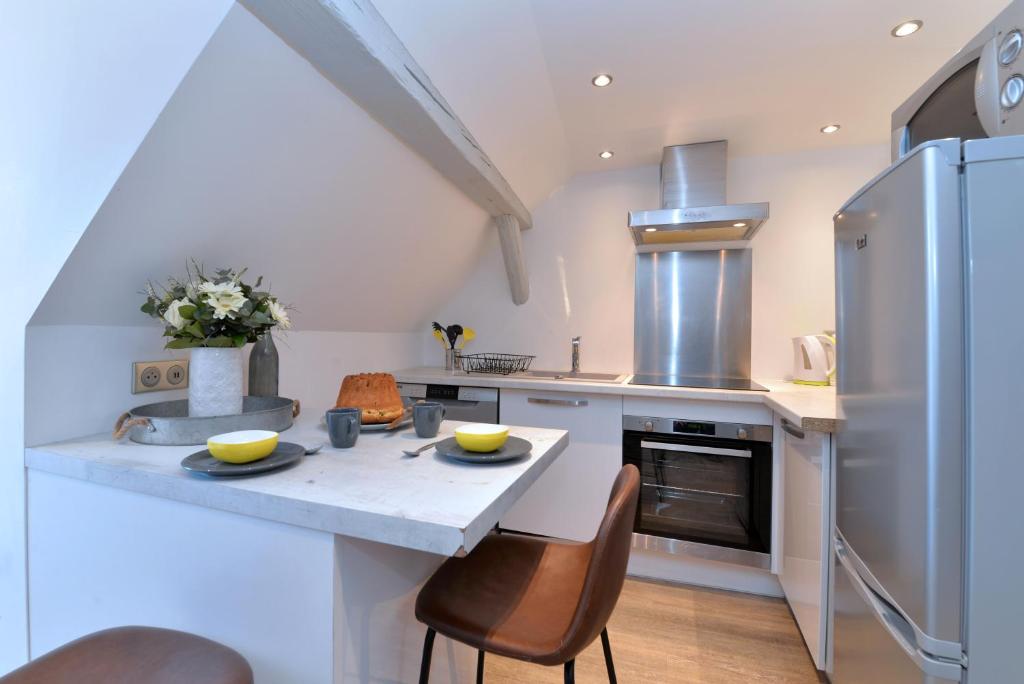 Appartement La petite terrasse sur les toits – photo 13