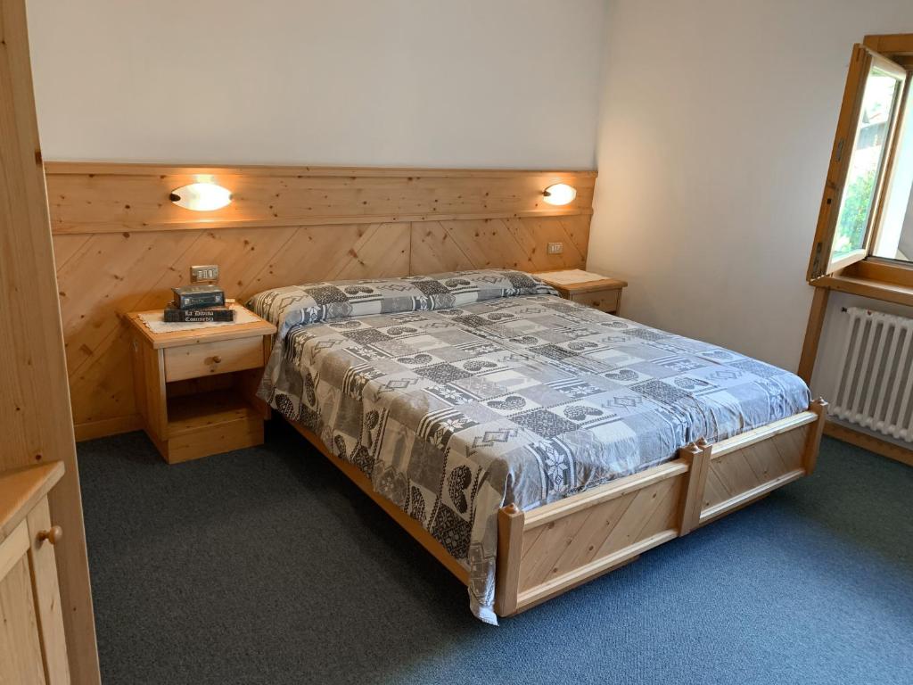A bed or beds in a room at Residence Sci Sport
