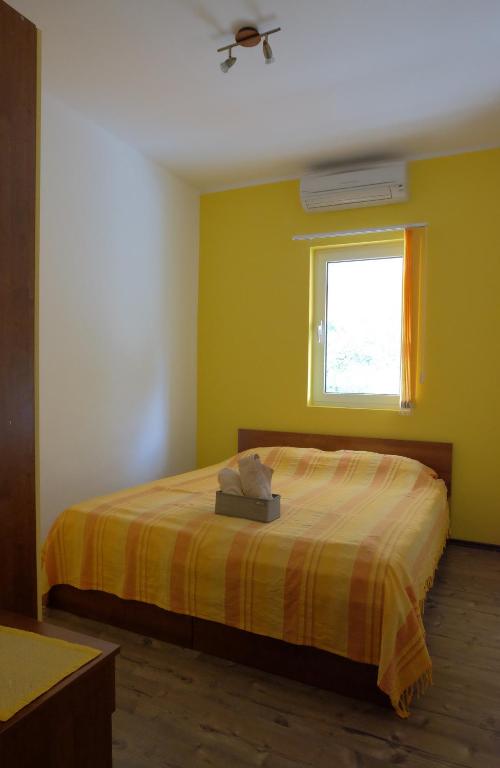 Postel nebo postele na pokoji v ubytování Apartman Precca