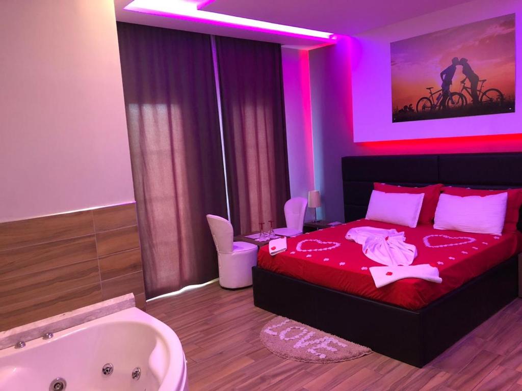 Uma cama ou camas num quarto em Hotel Golden