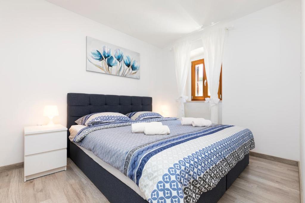 Posteľ alebo postele v izbe v ubytovaní Vacation house Orange