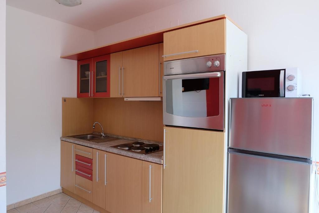 Kuchyň nebo kuchyňský kout v ubytování Apartman Precca