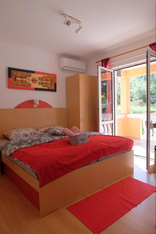 Postel nebo postele na pokoji v ubytování Apartman Precca