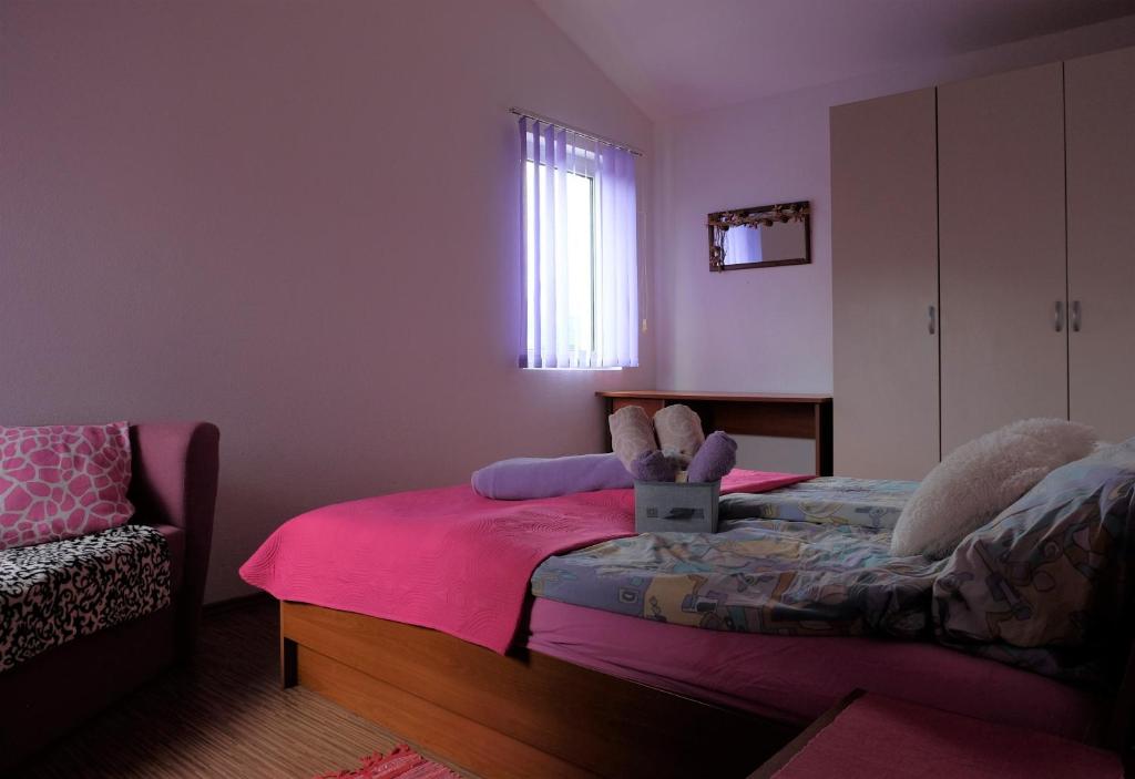 Postel nebo postele na pokoji v ubytování Apartman Precca