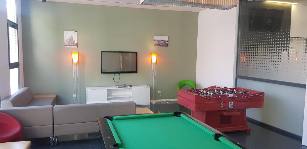 TV a/nebo společenská místnost v ubytování Alojamientos Universitarios Resa Hipatia