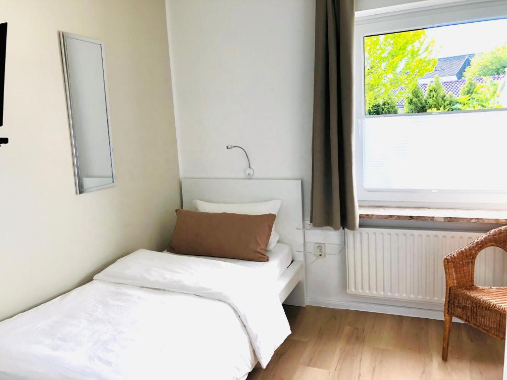 Postel nebo postele na pokoji v ubytování Pension Maren