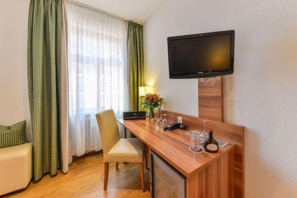 TV a/nebo společenská místnost v ubytování Gasthaus Pillhofer