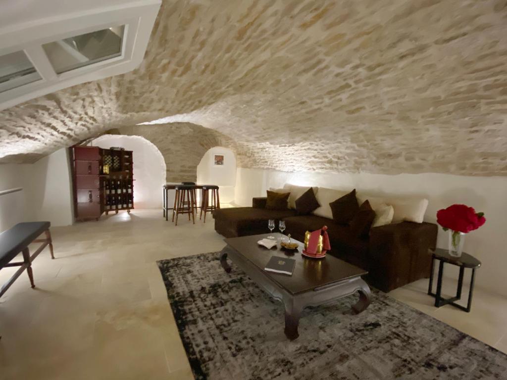Posezení v ubytování Hôtel Le Cep & Spa