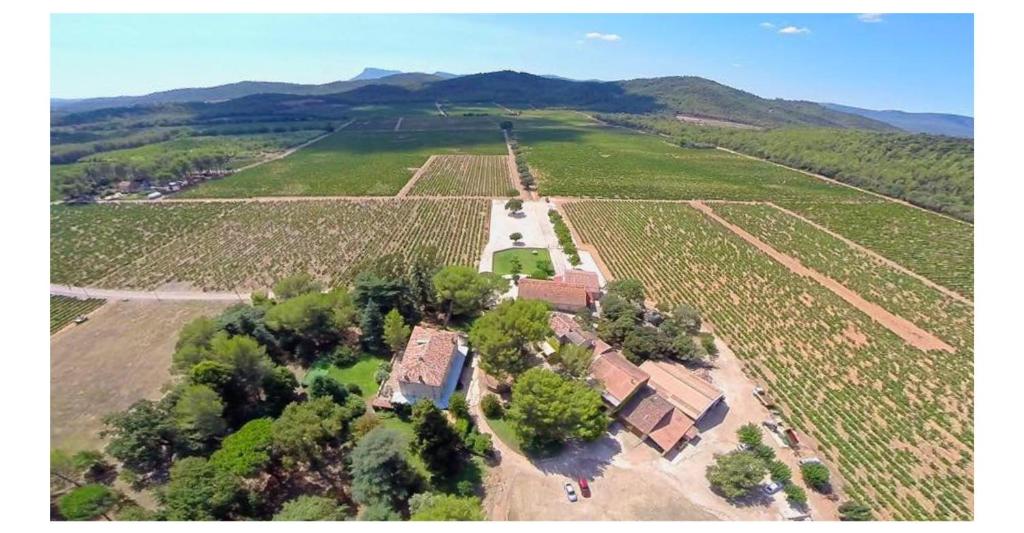 an aerial view of a house in a field at Domaine De Sigalous in La Crau