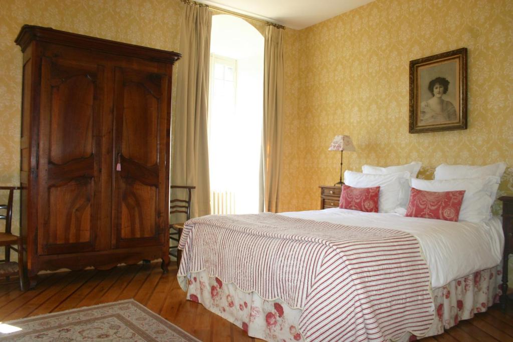 Postel nebo postele na pokoji v ubytování Château de Camon