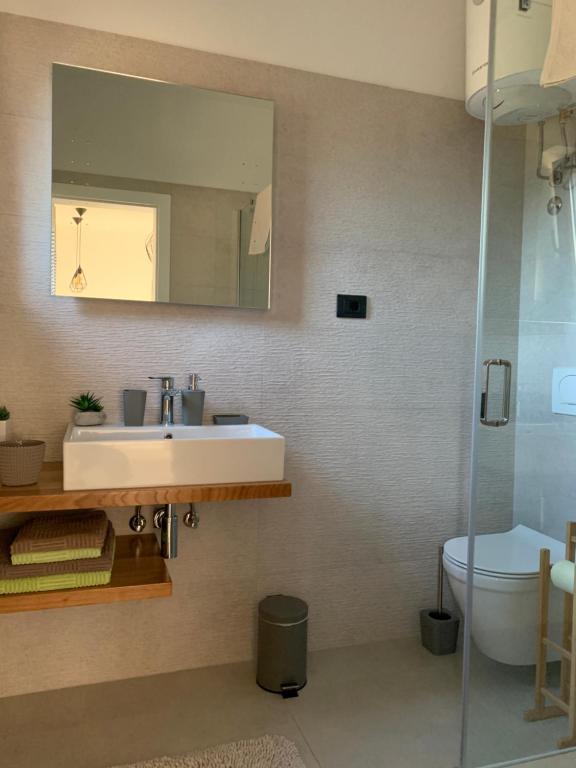 Kúpeľňa v ubytovaní Apartments & Room Piutti