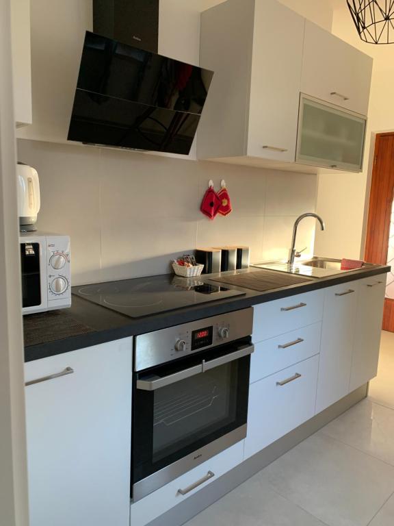 Kuchyňa alebo kuchynka v ubytovaní Apartments & Room Piutti