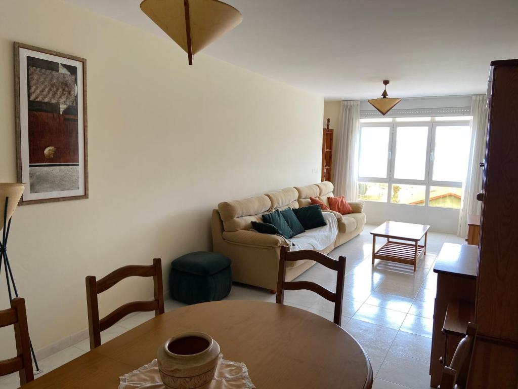 Posedenie v ubytovaní Apartamento en primera línea de playa en Laxe