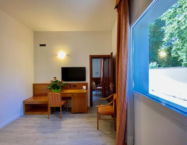 TV a/nebo společenská místnost v ubytování Hotel Garibaldi