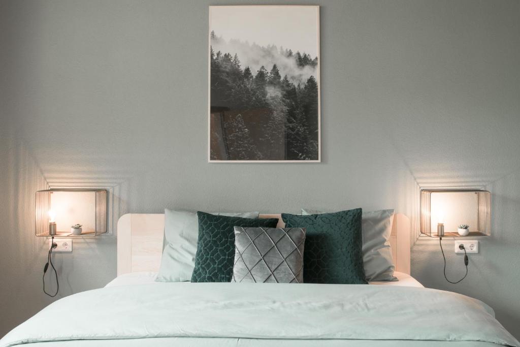 Una cama o camas en una habitación de Home@Moos