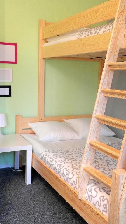 Postel nebo postele na pokoji v ubytování Olive Hostel