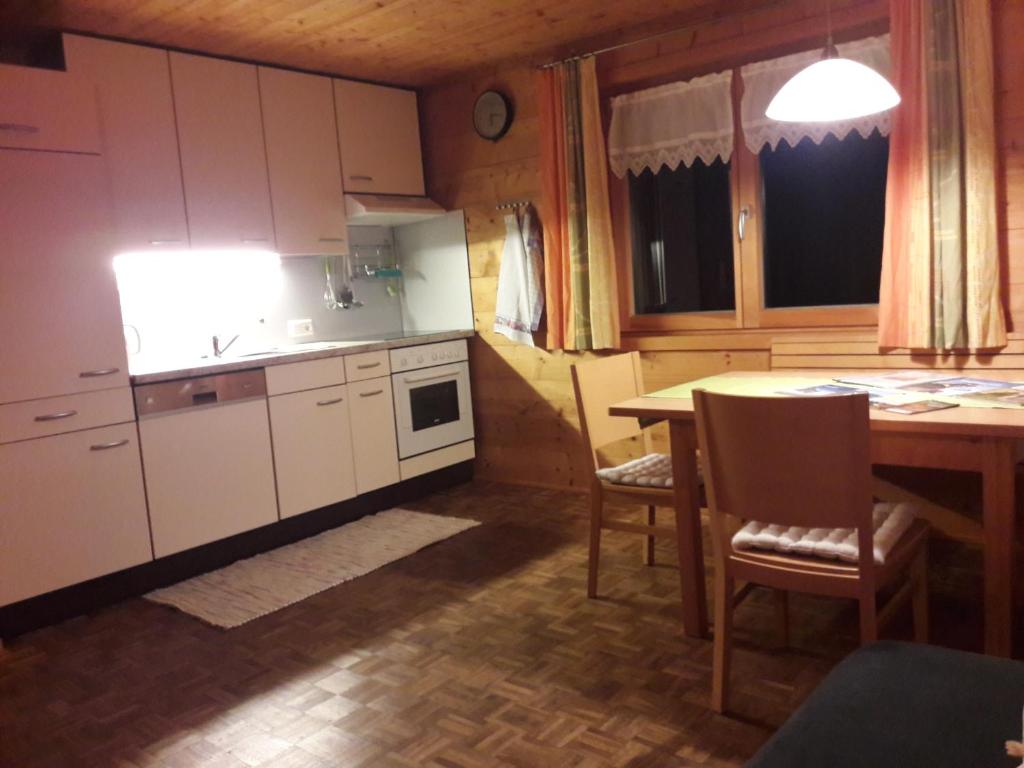 Kuchyň nebo kuchyňský kout v ubytování Apart Greber