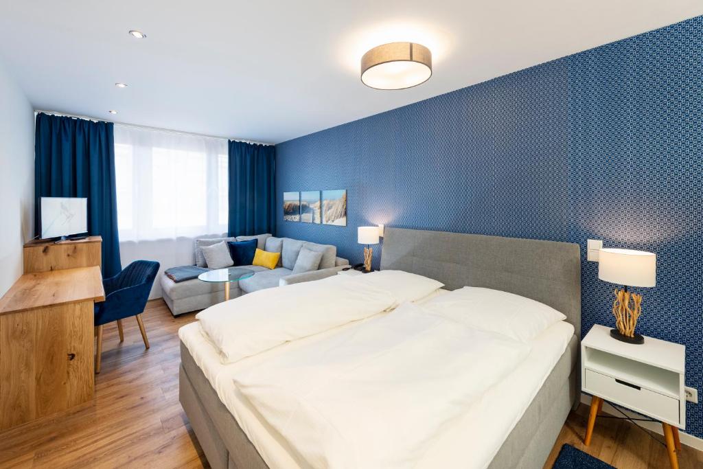 Postel nebo postele na pokoji v ubytování Hotel Storck