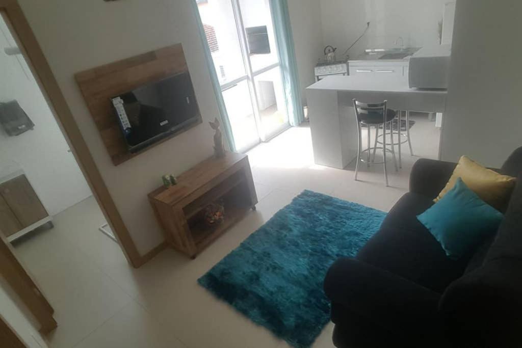  Ap central 1 dorm. Garagem Ar cond.