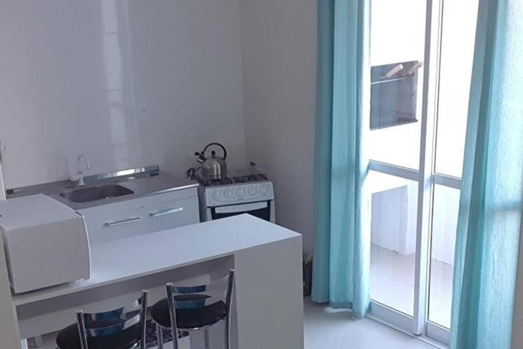  Ap central 1 dorm. Garagem Ar cond.