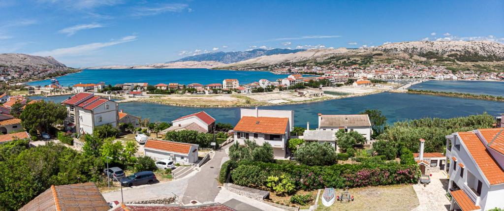 an aerial view of a town next to a body of water at Apartment Plemić in Pag