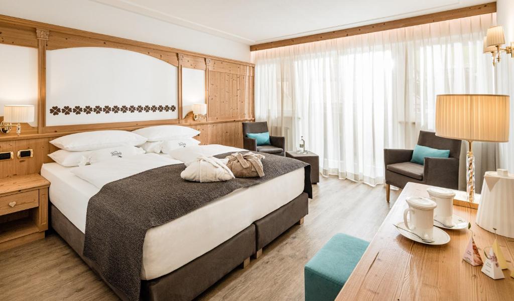Postel nebo postele na pokoji v ubytování Giardin Boutique Hotel B&B