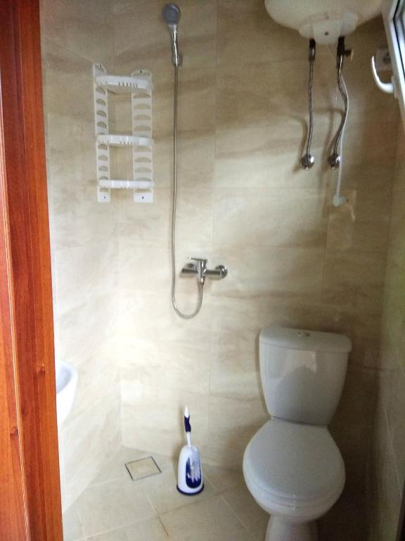 Koupelna v ubytování Mini Hotel Уютный дворик