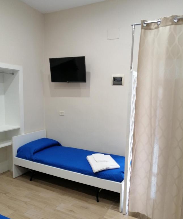 A bed or beds in a room at M & M