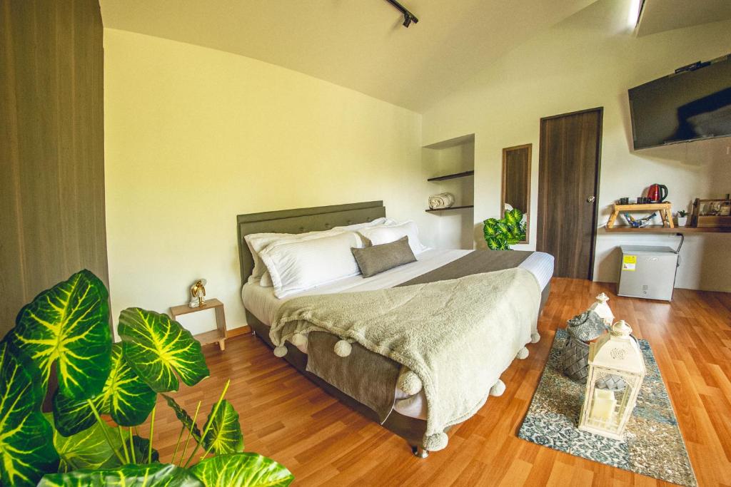 Postel nebo postele na pokoji v ubytování Mumu by Bernalo Hotels