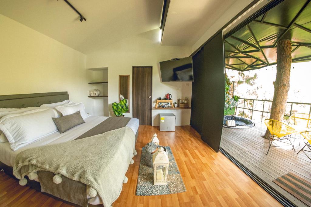 Postel nebo postele na pokoji v ubytování Mumu by Bernalo Hotels