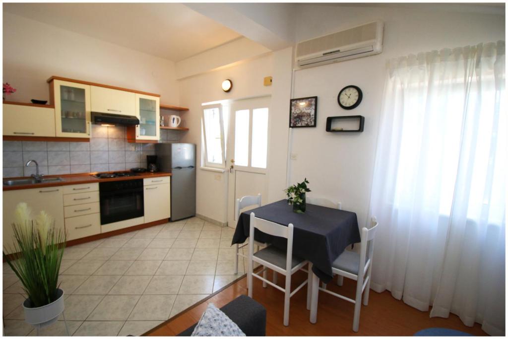 Kuchyň nebo kuchyňský kout v ubytování Studio Apartman Elena