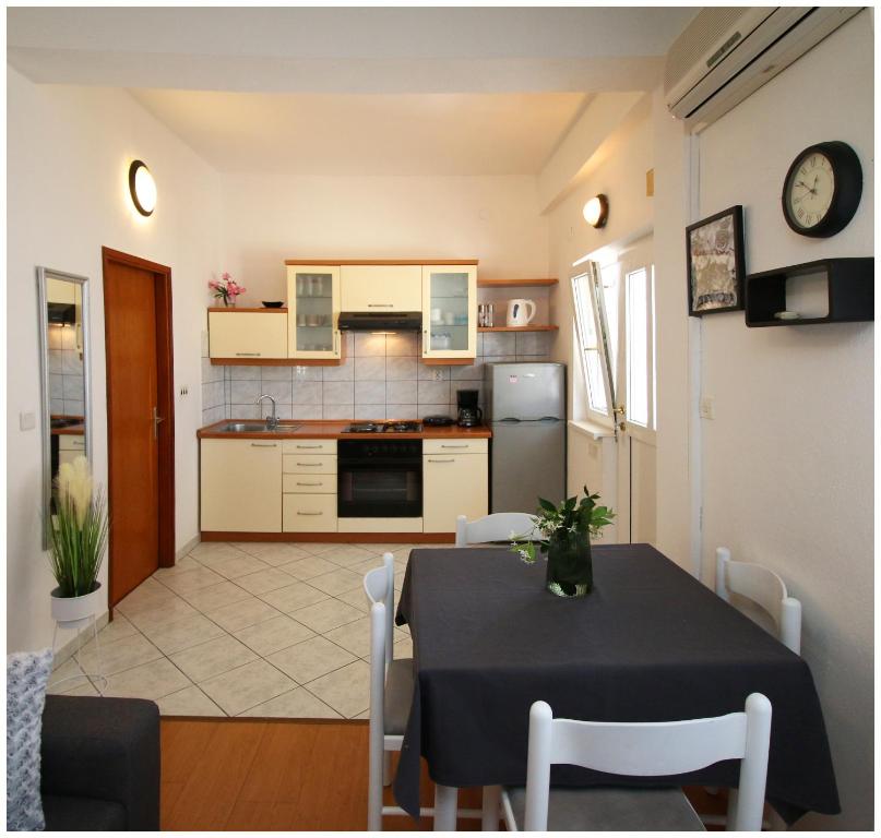 Kuchyň nebo kuchyňský kout v ubytování Studio Apartman Elena