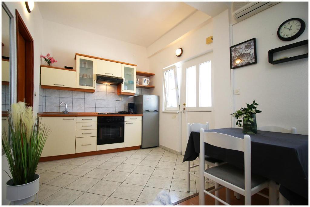 Kuchyň nebo kuchyňský kout v ubytování Studio Apartman Elena