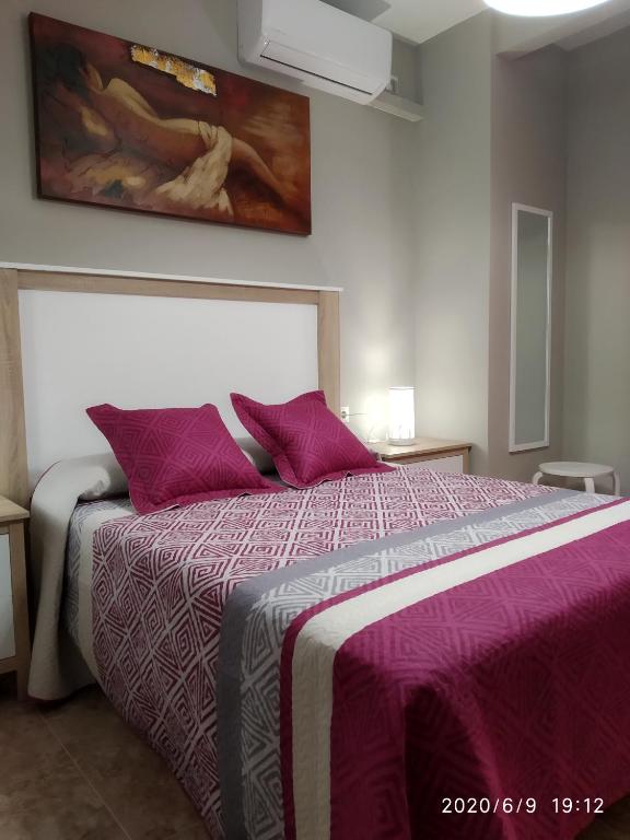 Posteľ alebo postele v izbe v ubytovaní Casa Miguel y Petra