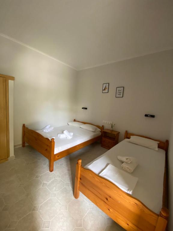 Postel nebo postele na pokoji v ubytování Faros Studios