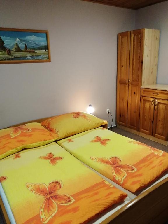 Postel nebo postele na pokoji v ubytování Penzion Jendrál